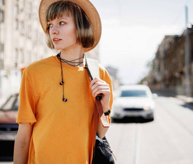 young-girl-with-headphones-in-a-yellow-t-shirt-FAKBSYC.jpg